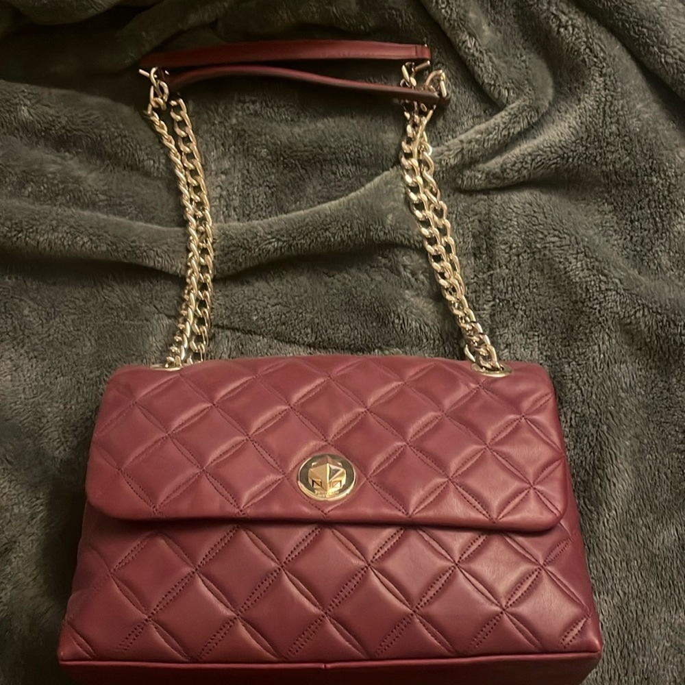 New Kate spade Natalia bag. Never used but tags have been removed.